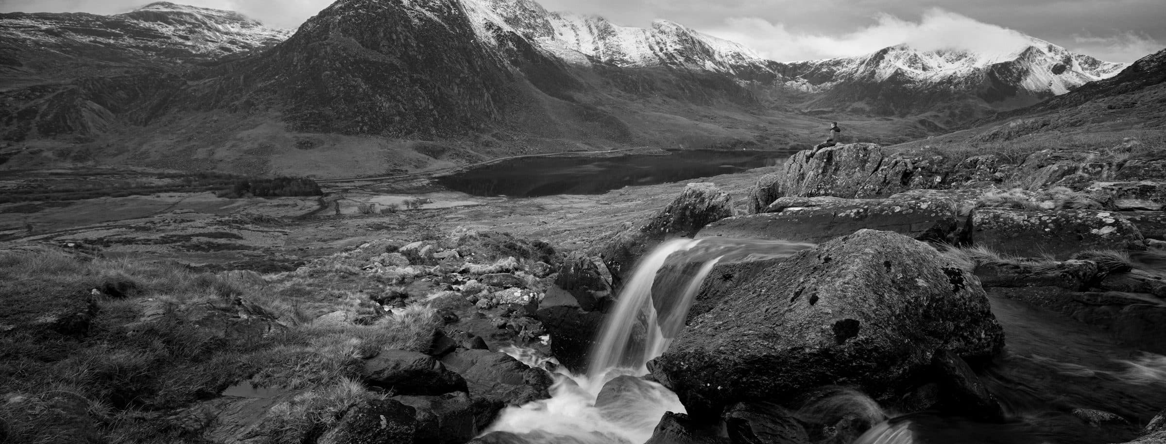 A ridge line above a valley in Eryri, North Wales.